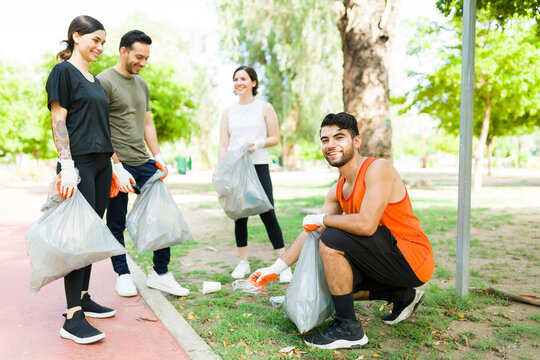 Portrait of an attractive man cleaning the park