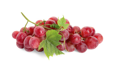 Cluster of ripe red grapes with green leaves on white background