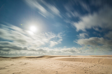 Windi day over sand dunes.
