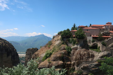 Fototapeta na wymiar Monastery built on to of tall rocks in Meteora, Greece