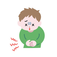 腹痛で苦しそうにお腹を押さえている男の子