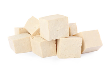 Cubes of delicious raw tofu on white background
