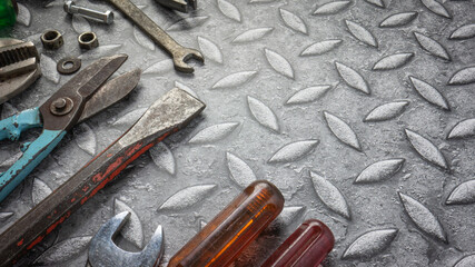 tools  on Checker plate  for safety  or engineer concept.