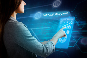 Business, Technology, Internet and network concept. Young businessman working on a virtual screen of the future and sees the inscription: Inbound marketing