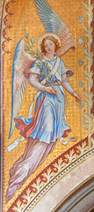 Fototapeta na wymiar VIENNA, AUSTIRA - JUNI 24, 2021: The fresco of angel with the flower in the Votivkirche church by brothers Carl and Franz Jobst (sc. half of 19. cent.).