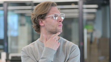 Portrait of Pensive Man Thinking
