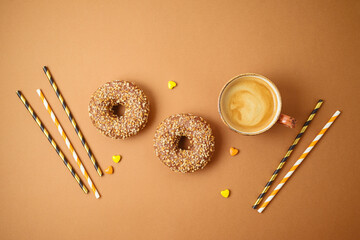 Coffee cup and donuts. Autumn season concept background.