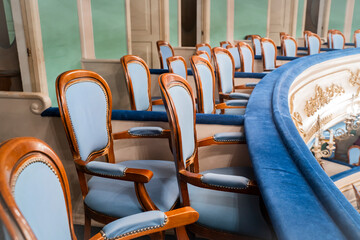 Rows  empty chairs of seats  in the cinema, theater, auditorium, conference hall, congress,...