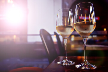 cocktail in a modern restaurant / glass with a bright cocktail in the fashionable interior serving in the restaurant, nightclub