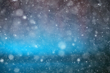abstract blurred background, snow falls on the sea, northern cold sea, climate winter view