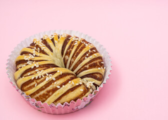 Bread on light pink background.