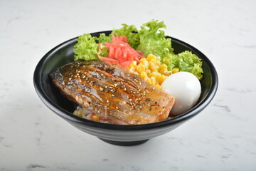 japanese bbq grill teriyaki salmon seafood with boiled egg, corn, red ginger and rice bowl with onsen egg in black bowl in white marble healthy poke bowl menu