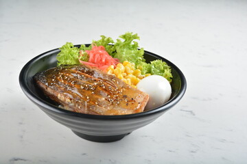 japanese bbq grill teriyaki salmon seafood with boiled egg, corn, red ginger and rice bowl with onsen egg in black bowl in white marble healthy poke bowl menu