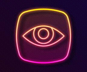 Glowing neon line Security camera icon isolated on black background. Vector