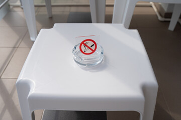 Ashtray and no smoking sign