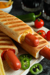 Concept of tasty food with french hot dog