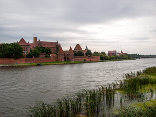 Naklejka na ściany i meble Malbork Castle, formerly Marienburg Castle, the seat of the Grand Master of the Teutonic Knights, Malbork, Poland