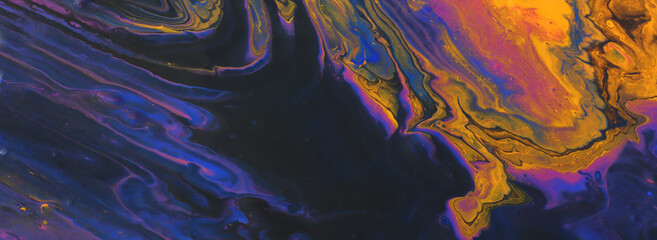 art photography of abstract marbleized effect background. Turquoise, purple, gold, yellow, blue and black creative colors. Beautiful paint