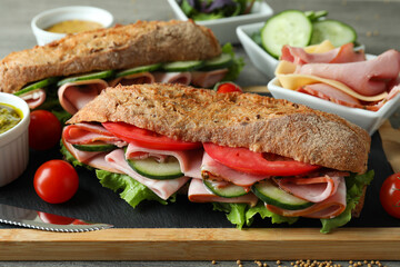 Concept of tasty eating with ciabatta sandwiches, close up