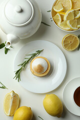 Obraz na płótnie Canvas Concept of tasty breakfast with lemon cupcake on white background