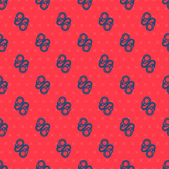 Blue line Handcuffs icon isolated seamless pattern on red background. Vector