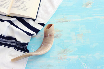 religion image of shofar (horn) on white prayer talit. Rosh hashanah (jewish New Year holiday),...