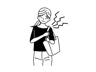 鞄を持って片方の肩に負担がかかっている女性-黒