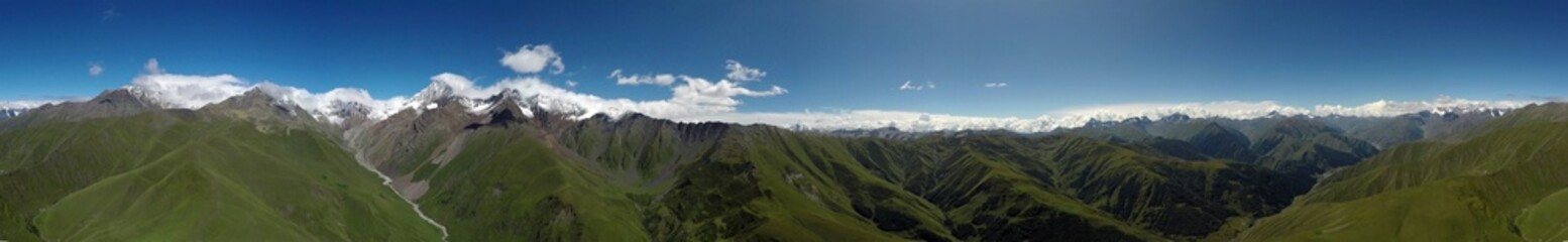 Fototapeta na wymiar Caucasus, Ossetia. Lladon Gorge. Aerial panorama to the south of Tepli mountain.