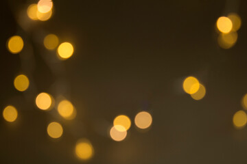 Festive black background of glowing garland