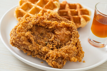 fried chicken waffle with honey or maple syrup