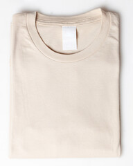 Cream color plain t-shirt mockup template. Plain t-shirt isolated on white background. Clothing for...