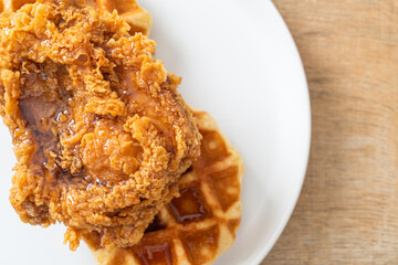 fried chicken waffle with honey or maple syrup