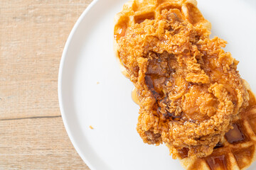 fried chicken waffle with honey or maple syrup