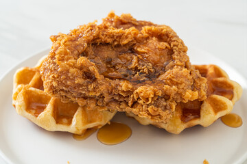 fried chicken waffle with honey or maple syrup