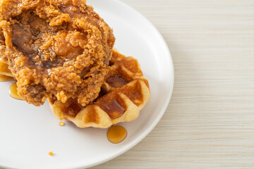 fried chicken waffle with honey or maple syrup