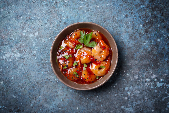 Tasty Bright Seafood. Bowl Of Shrimps In Spicy Asian Red Sauce