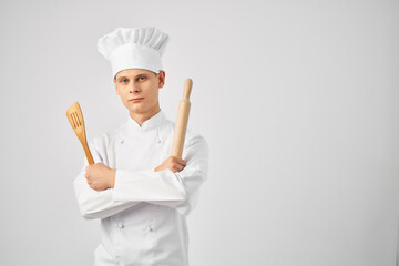male chef kitchenware cooking professional light background