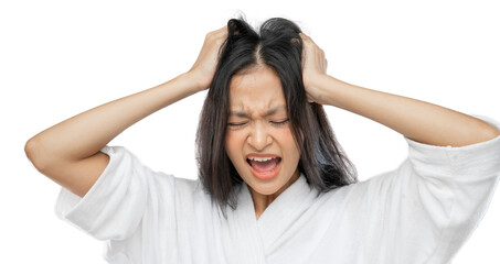 a woman wearing a towel holds her head and screams with a frustrated expression on a light gray background