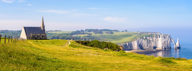 Panoramic view of Notre-Dame de la Garde chapel, the arch and the Needle in Etretat, Normandy