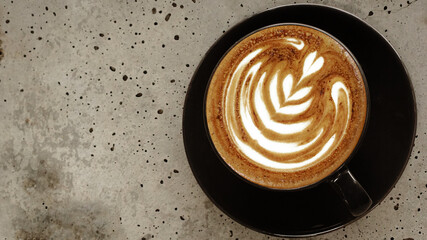 Fototapeta na wymiar a cup of latte art coffee for background 