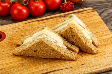 Club sandwich with chicken and cheese