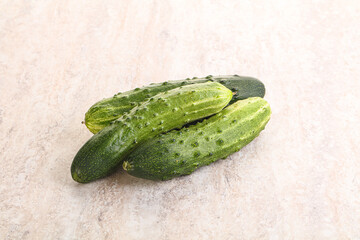 Fersh juicy green cucumbers heap