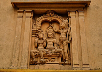 detail of the carvings on the wall of the main temple of Kelaniya. In Colombo, Sri Lanka