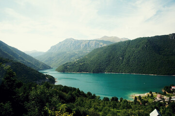 Fototapeta na wymiar MONTENEGRO: Scenic landscape view of the fjord with mountains and blue water 