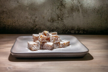 Traditional Turkish Delight on wooden background