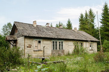 Fototapeta na wymiar Abandoned house in summer day, Latvia.