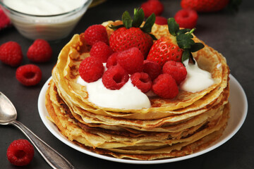 Russian cuisine national dish bliny with fresh berries