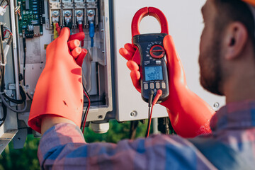 Engineer doing check up in solar panels
