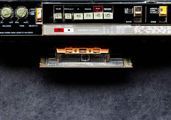 Top view retro radio on black floor with copy space