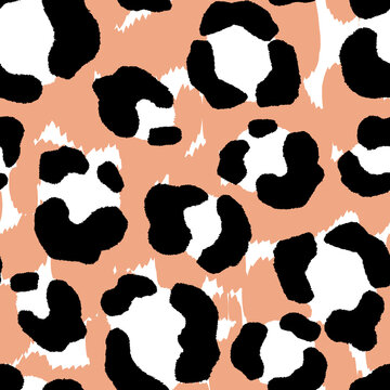 Abstract modern leopard seamless pattern. Animals trendy background. Black and beige decorative vector stock illustration for print, card, postcard, fabric, textile. Modern ornament of stylized skin
